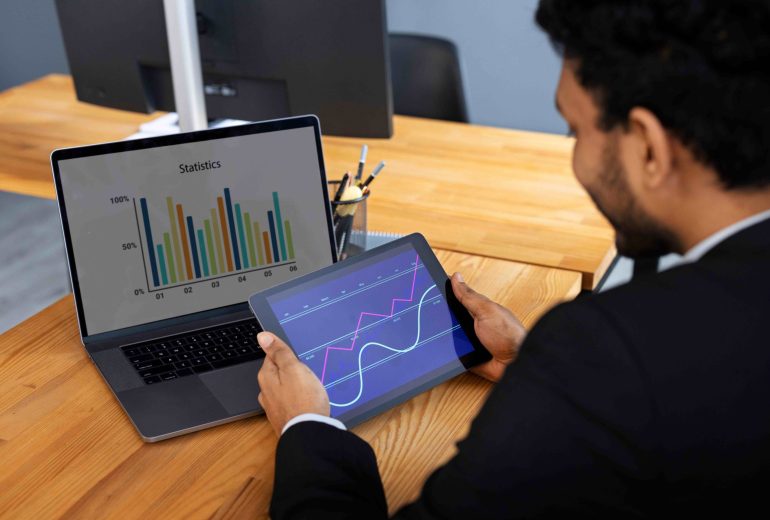 business-person-looking-finance-graphs_11zon